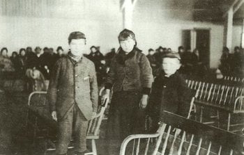 This newly discovered photo may be Annie Moore on Ellis Island with her brothers. honoring annie moore sassy jane genealogy